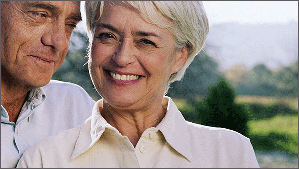Mature couple smiling following colonoscopy